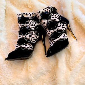 Stunning, barely worn YSL open toe booties. Made in Italy.